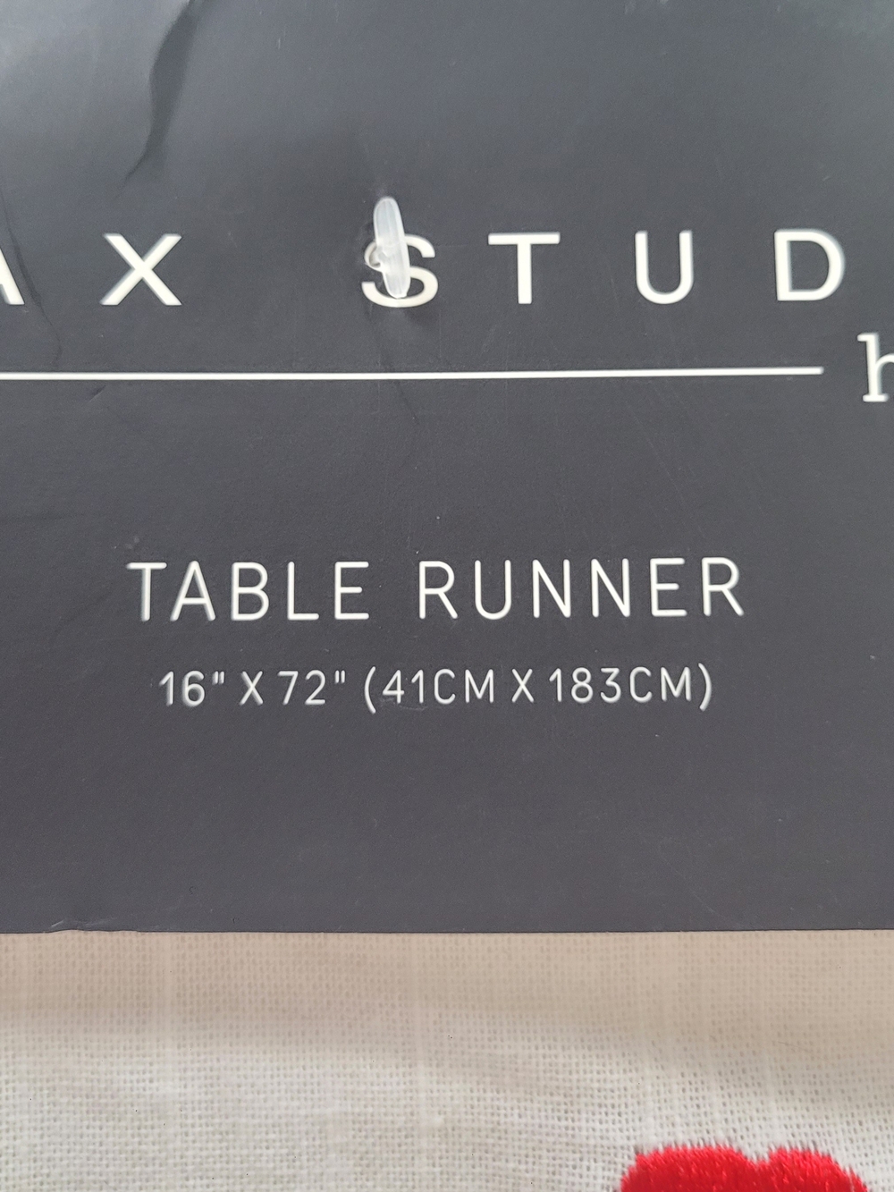 This is  Max Studio Home Table Runner,featuring an embroidered  Red Poppy floral